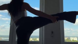Solo Female yoga in tight leggings-5
