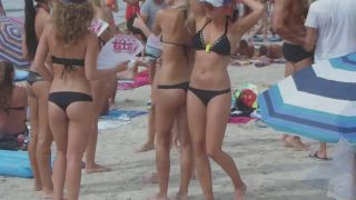 Club promoters dancing on beach-6