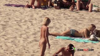 Her sexy body gets a tan after she strips naked-3