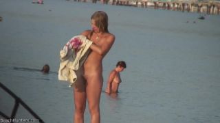 Pretty girl topless on the beach-2