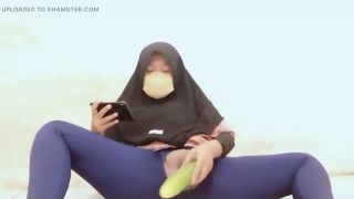 Watching Porn Indonesian hijab aunt wearing cucumber-5