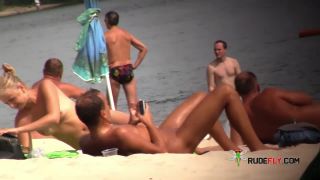Check out this naturist showing off her shaved pussy 5-8