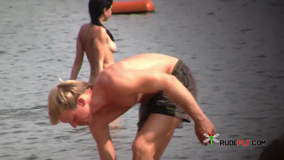 Check out this naturist showing off her shaved pussy 5