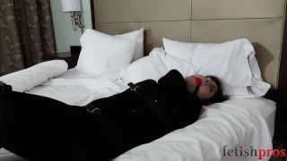 Mia Hope Helplessly Trapped in a Black Bondage Sleepsack ...-7