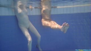 Two chicks naked in pool-1