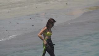 Surf babe gets out of wetsuit-0