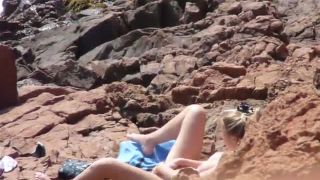 voyeur blonde girl fingering pussy on the beach-0