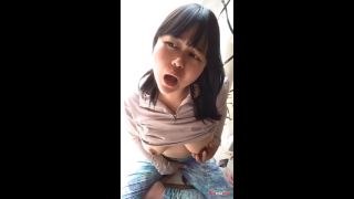 Busty Japanese woman masturbates by the window.-5