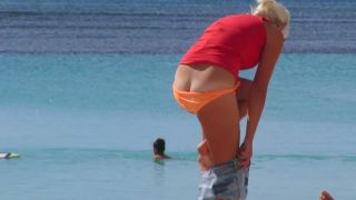 Milf's bikini malfunction on beach-0