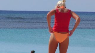 Milf's bikini malfunction on beach-7