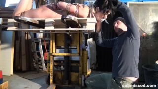 Submissed e329 Leyla hogtied tapegagged forklifted-2