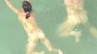 Spying two teenagers fuck in the water-9