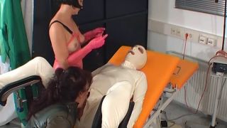 Rubbernurse Playing With Her Slave - Rubber & Clinic Studio - 1atoys.-1