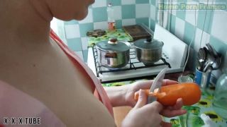  homepornframes  Chubby Housewife Playing With Carrot On Kitchen Table  Homemade-1