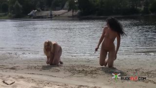 Gorgeous nudist youth gets an all over  tan-1