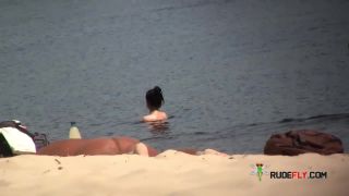 Naturist doll not shy about posing nude at the plage  2-5