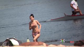 Naturist doll not shy about posing nude at the plage  2-7