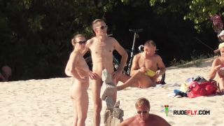 Busty dame shows her naked body at the nude  plage-7