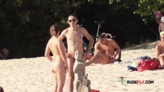 Busty dame shows her naked body at the nude  plage-8