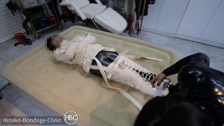 Hinako Bondage Clinic – Taped Down to the Bed in a Latex Cat Suit and Canvas Straitjacket - [Femdom porn]-4