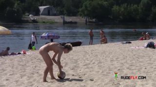 Teen nudists get naked and heat up a public  beach-4