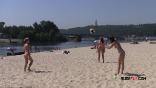 Teen nudists get naked and heat up a public  beach-5