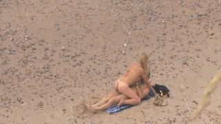 Older guy fucks a teen girl on a beach-0