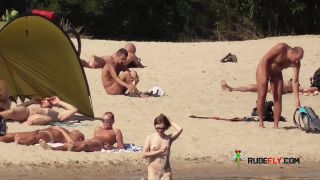 Nymph naturists get naked and heat up a public  strand-5