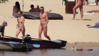 Dark haired naturist strand teen gets an all over  tan-1