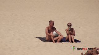 Dark haired naturist strand teen gets an all over  tan-7