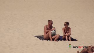 Dark haired naturist strand teen gets an all over  tan-8