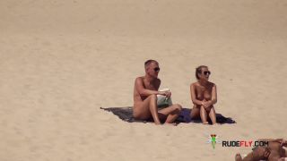 Dark haired naturist strand teen gets an all over  tan-9