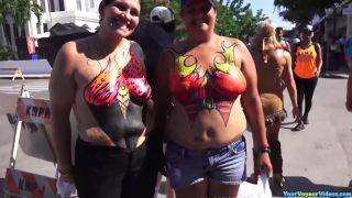 Busty gals showing painted tits-9