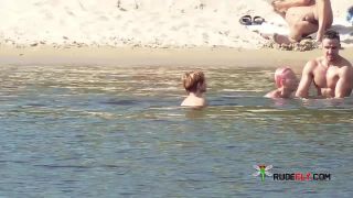 Long haired hottie shows her goods at the plage-1