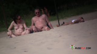 Sultry wet teen strips and tans on a nude beach  3-0