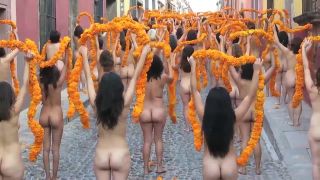 Public nudity with orange flowers on the street-2