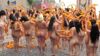 Public nudity with orange flowers on the street-8