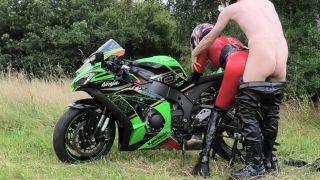 The hot biker girl is getting railed on her bike.-6