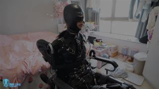 Miao in latex and gasmask on wheelchair-4