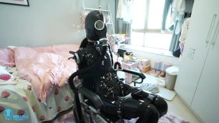 Miao in latex and gasmask on wheelchair-6