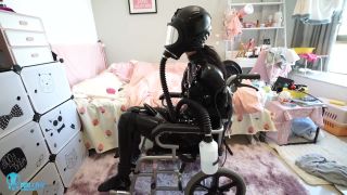 Miao in latex and gasmask on wheelchair-8