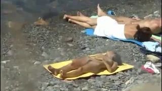 Skinny girl spied while lying on the beach Voyeur!-4