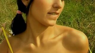 Anne plays with her pussy in the  fields-0